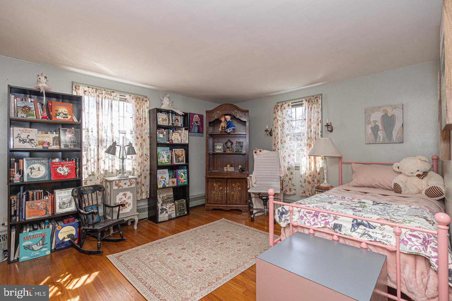 54 Eagle Road Newtown, PA 18940 - Photo 17 of 31 a bedroom with a bed furniture and a bookshelf
