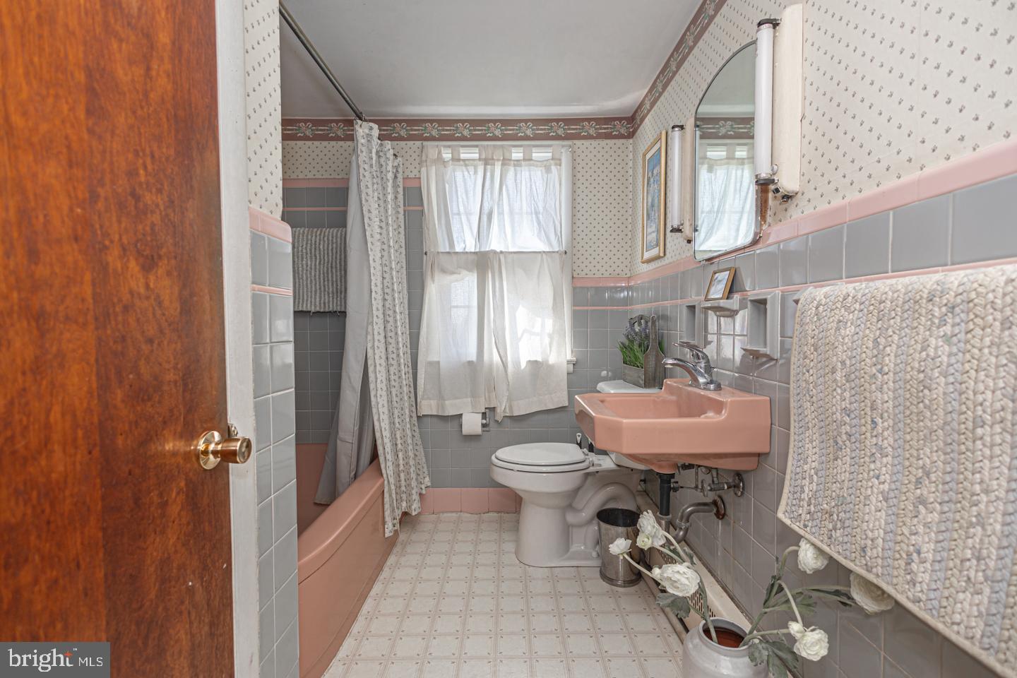 54 Eagle Road Newtown, PA 18940 - Photo 18 of 31 a bathroom with a toilet a sink and a mirror