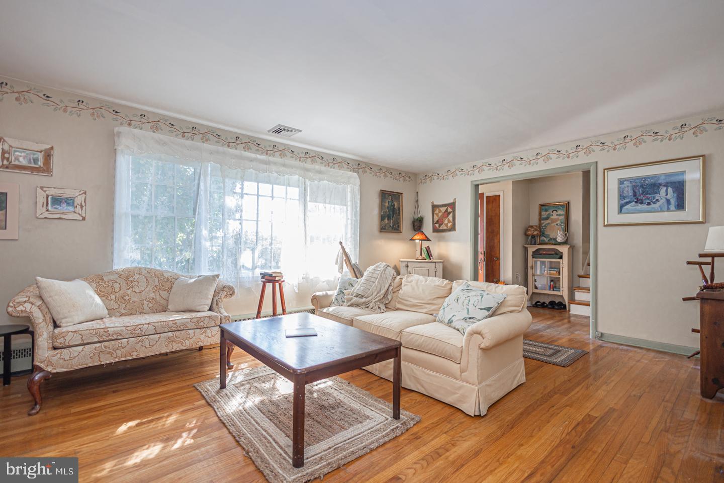 54 Eagle Road Newtown, PA 18940 - Photo 4 of 31 a living room with furniture and a large window