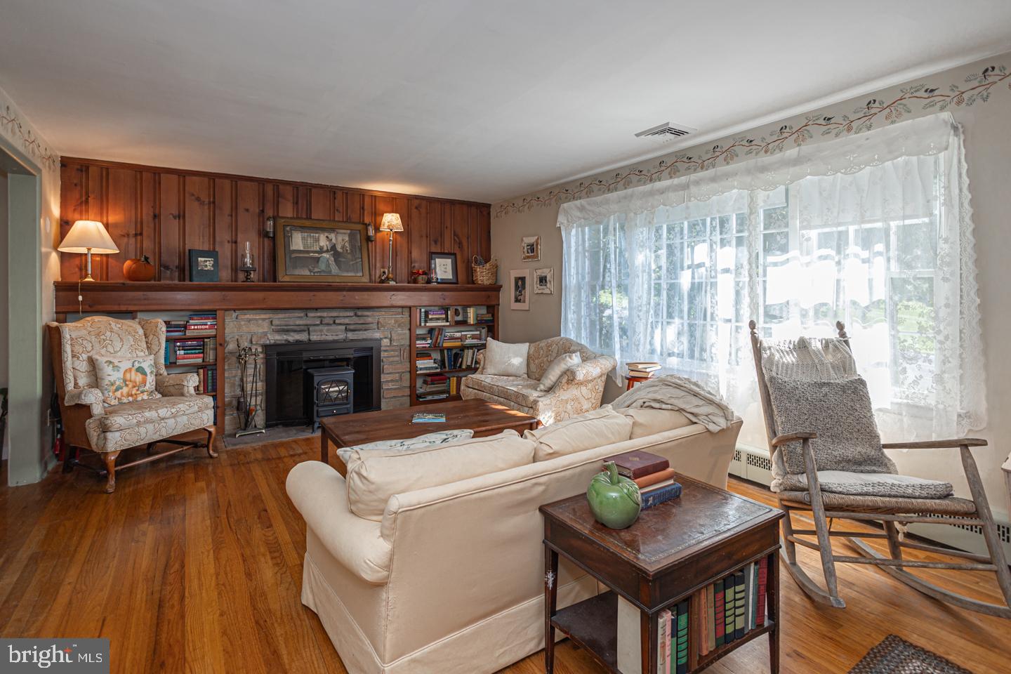 54 Eagle Road Newtown, PA 18940 - Photo 5 of 31 a living room with furniture and a fireplace