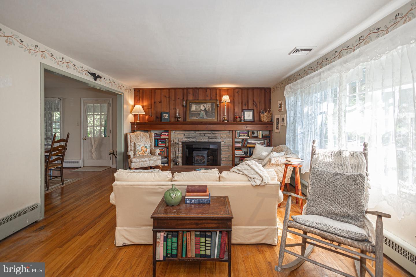 54 Eagle Road Newtown, PA 18940 - Photo 6 of 31 a living room with furniture and a fireplace