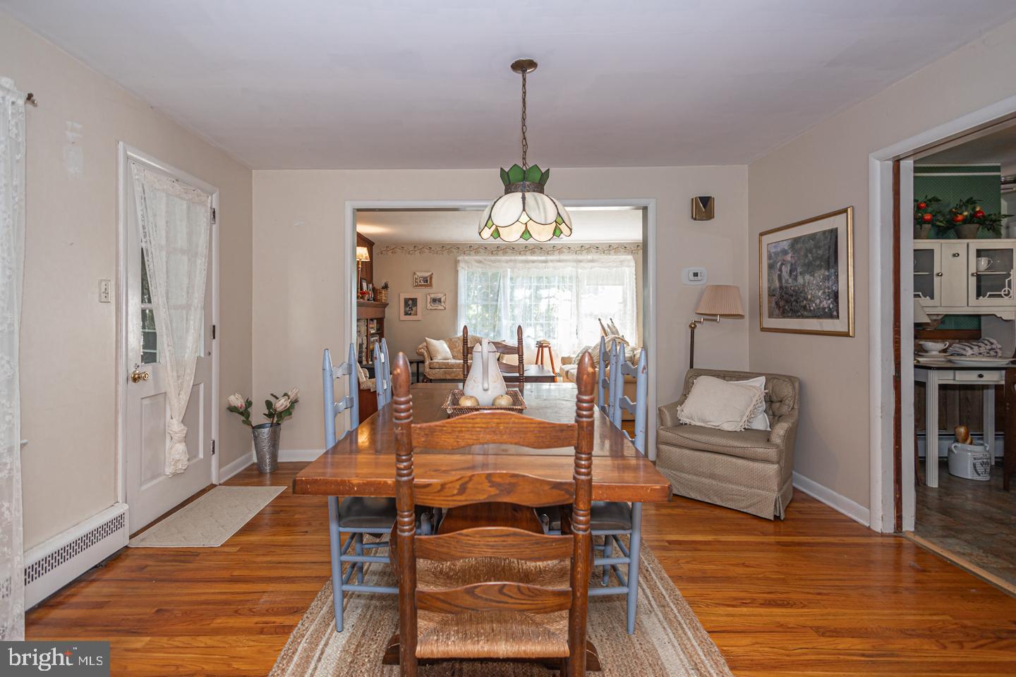 54 Eagle Road Newtown, PA 18940 - Photo 9 of 31 a living room with furniture and a chandelier