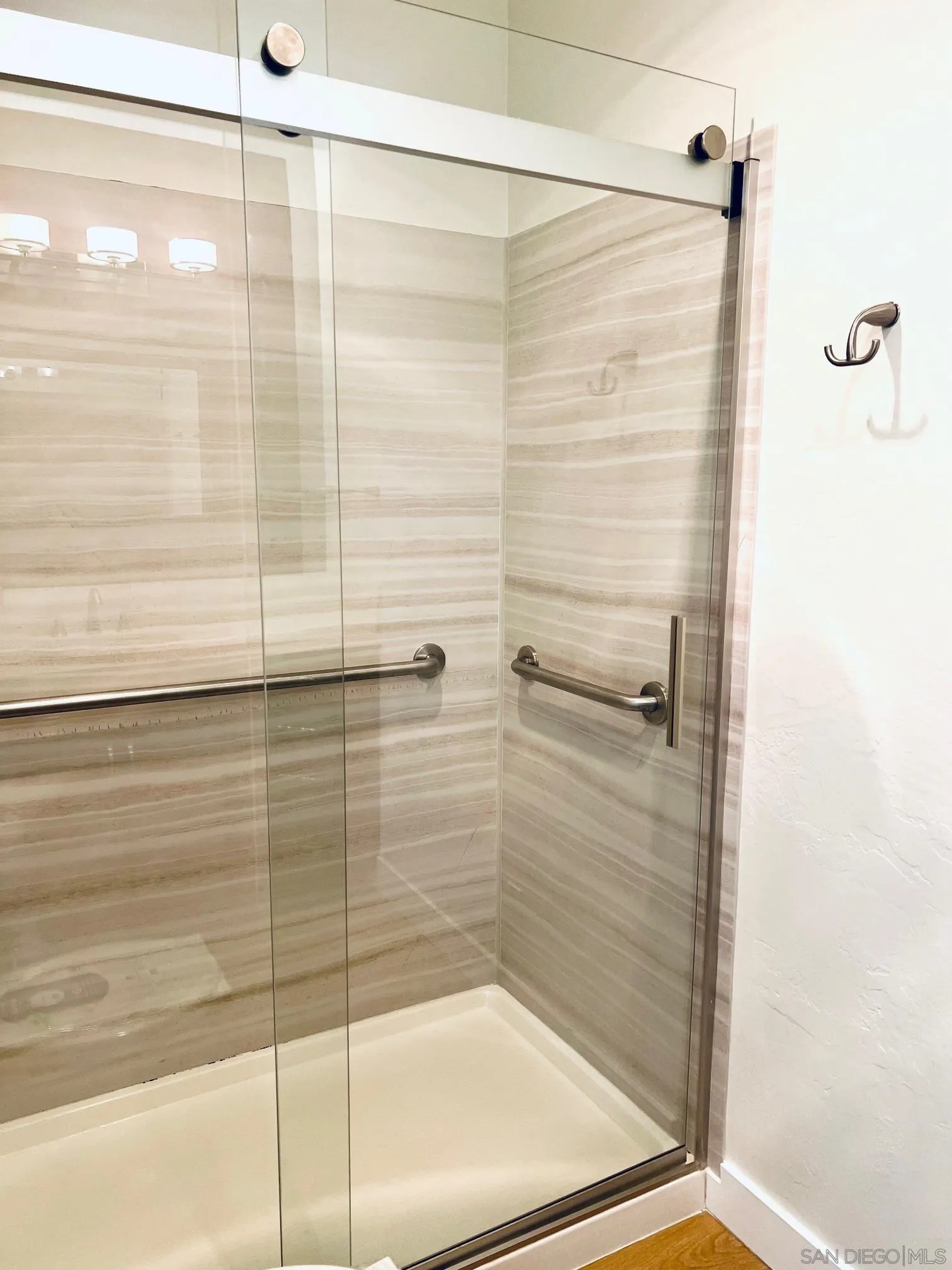 230 Prospect Street, Unit 33 La Jolla, CA 92037 - Photo 14 of 27 a bathroom with a shower