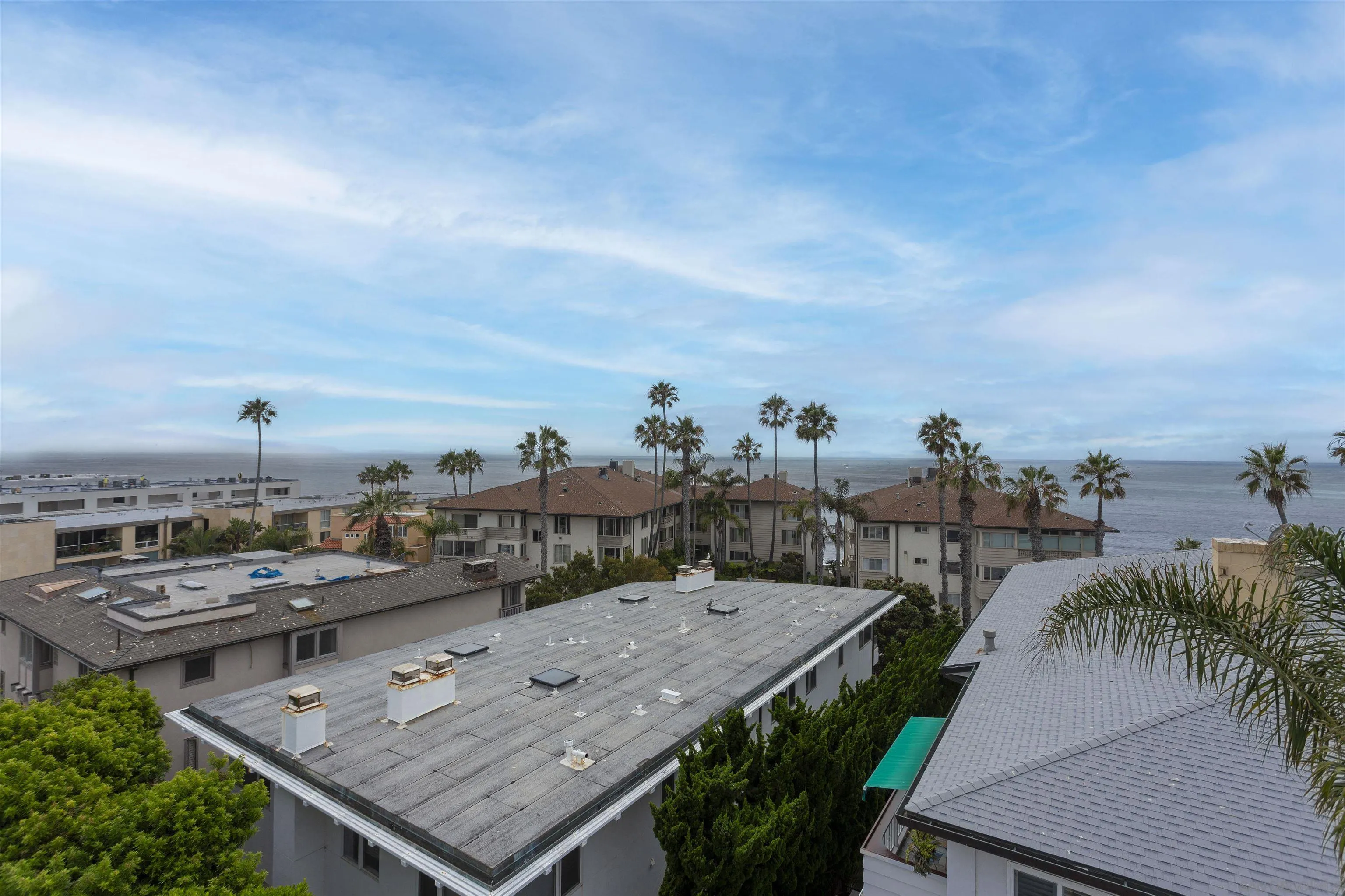 230 Prospect Street, Unit 33 La Jolla, CA 92037 - Photo 21 of 27 a view of a terrace with seating area and lake view