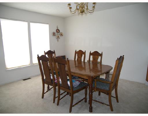 4238 Clendenning Road Gibsonia, PA 15044 - Photo 8 of 15 Dining Room. Entertain in the dining room with chandelier and neutral decor.