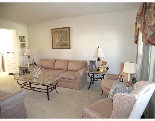 4238 Clendenning Road Gibsonia, PA 15044 - Photo 9 of 15 Living Room. Living room offers neutral decor and opens to the dining room.