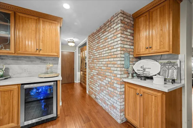 a bathroom with double vanity sinks and a mirror