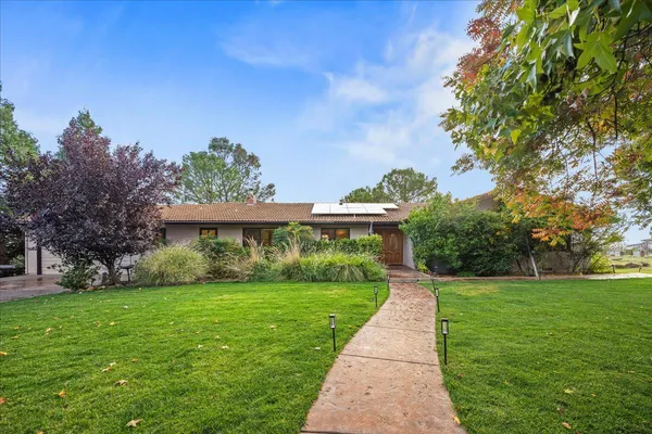 a view of house with garden
