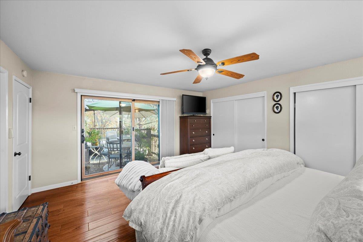 3900 Loma Drive Shingle Springs, CA 95682 - Photo 40 of 55 a bedroom with a bed and wooden floor