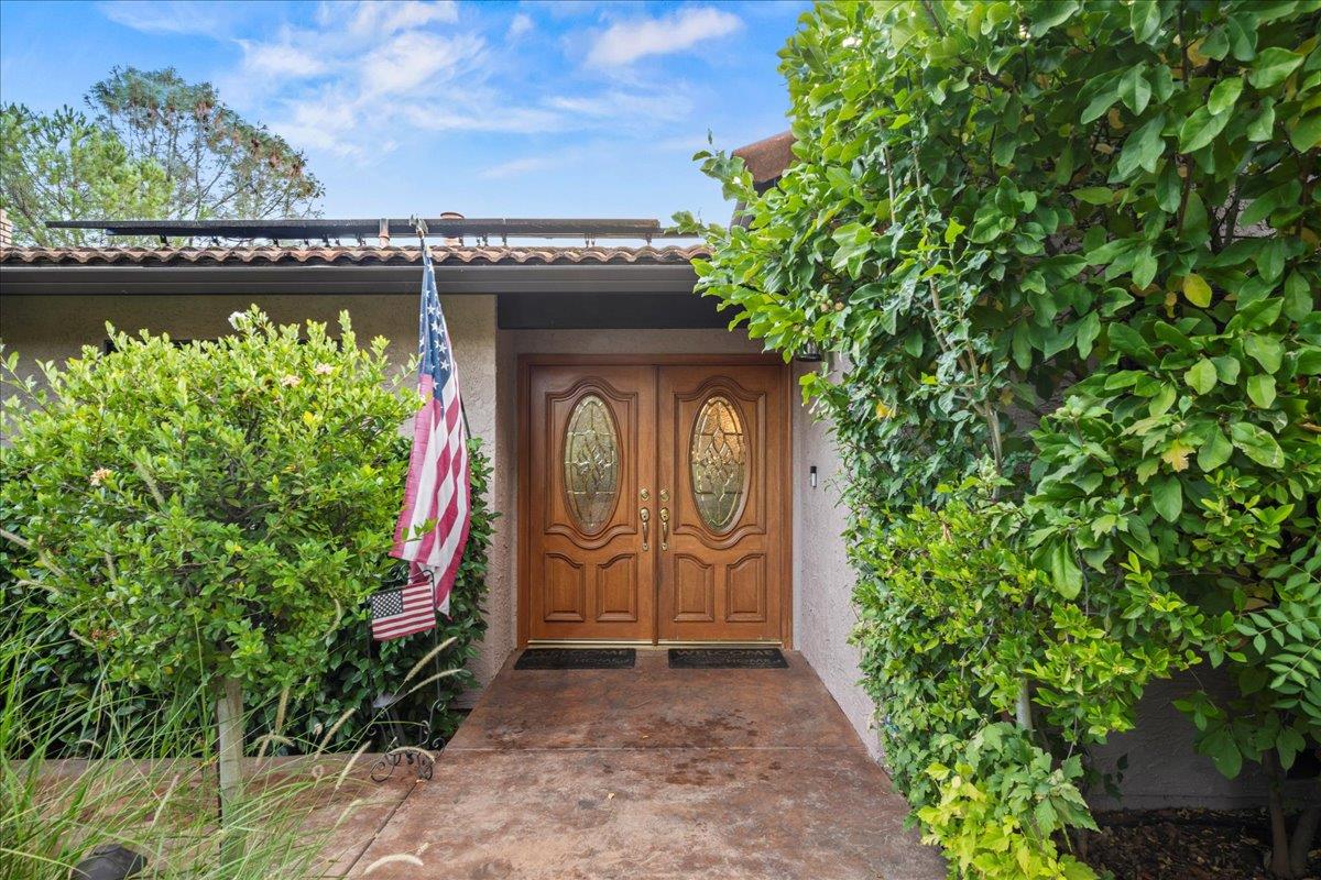 3900 Loma Drive Shingle Springs, CA 95682 - Photo 4 of 55 a front view of a house with lots of green space