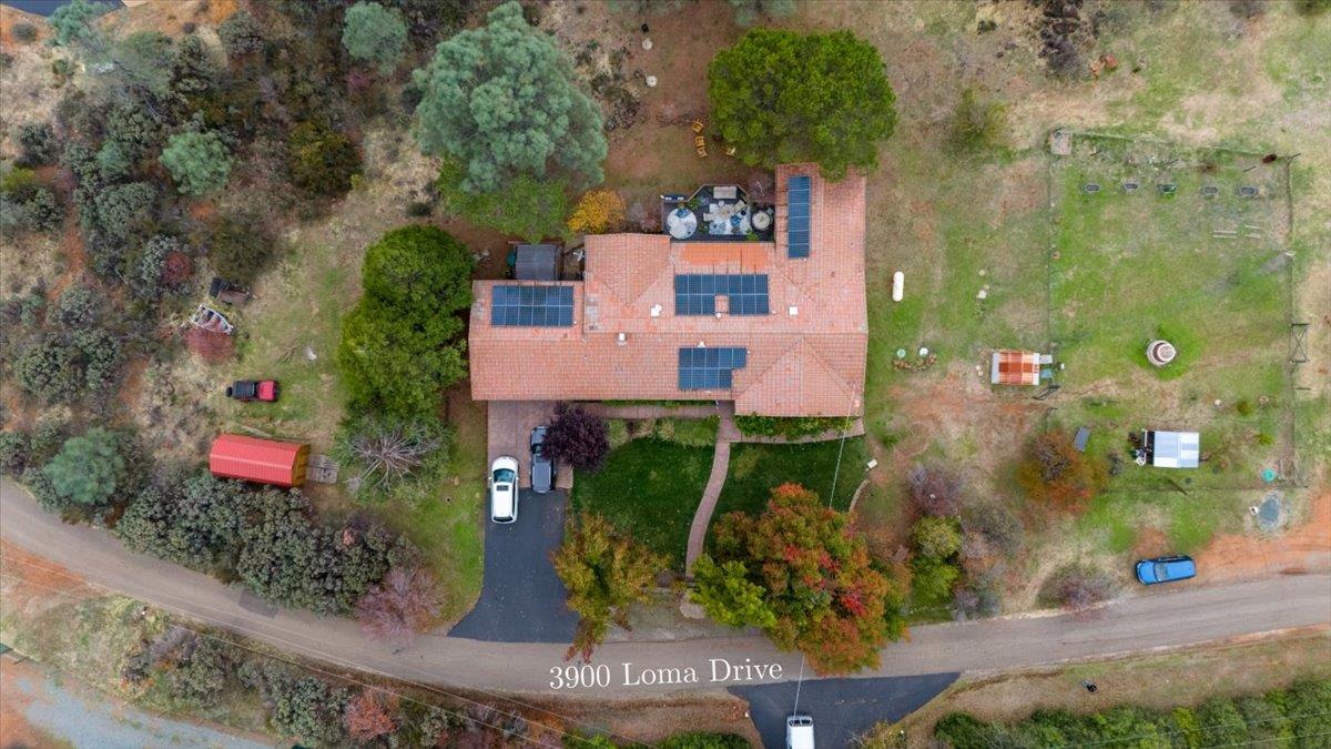 3900 Loma Drive Shingle Springs, CA 95682 - Photo 52 of 55 an aerial view of a house with a yard