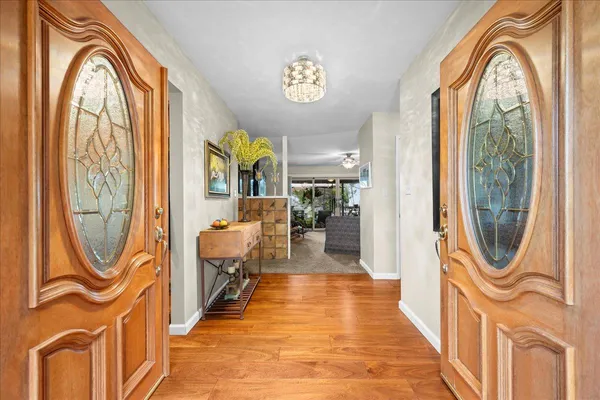 a view of a entryway with washer and dryer