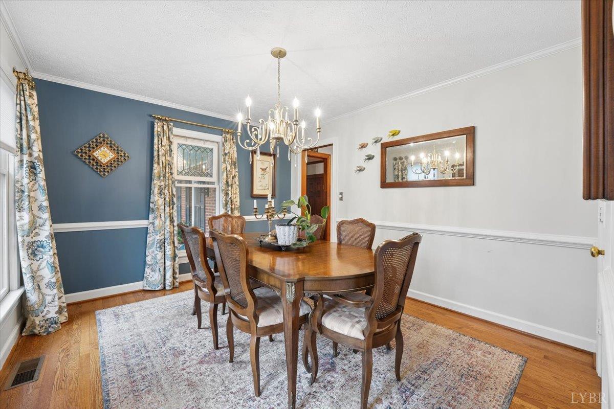 3289 Peaks Road Bedford, VA 24523 - Photo 24 of 71 a view of a dining room with furniture and chandelier
