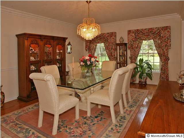 272 Portland Road Middletown, NJ 07716 - Photo 3 of 3 a view of a dining room with furniture and wooden floor