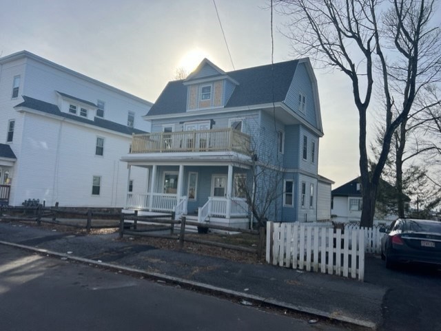 28 Kendall Street Lawrence, MA 01841 - Photo 1 of 7 a front view of a house with garden