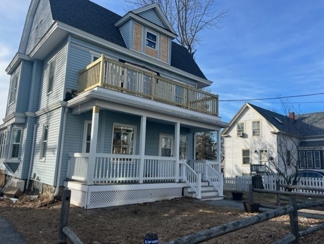 28 Kendall Street Lawrence, MA 01841 - Photo 5 of 7 a view of a brick house with many windows
