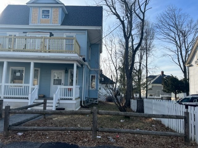 28 Kendall Street Lawrence, MA 01841 - Photo 6 of 7 a front view of a house with garden