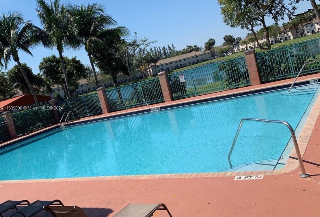 2921 Southeast 13th Road, Unit 10539 Homestead, FL 33035 - Photo 14 of 14 a view of balcony and yard