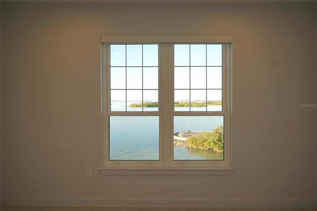 5000 Culbreath Key Way, Unit 9326 Tampa, FL 33611 - Photo 14 of 35 a view of an empty room and window