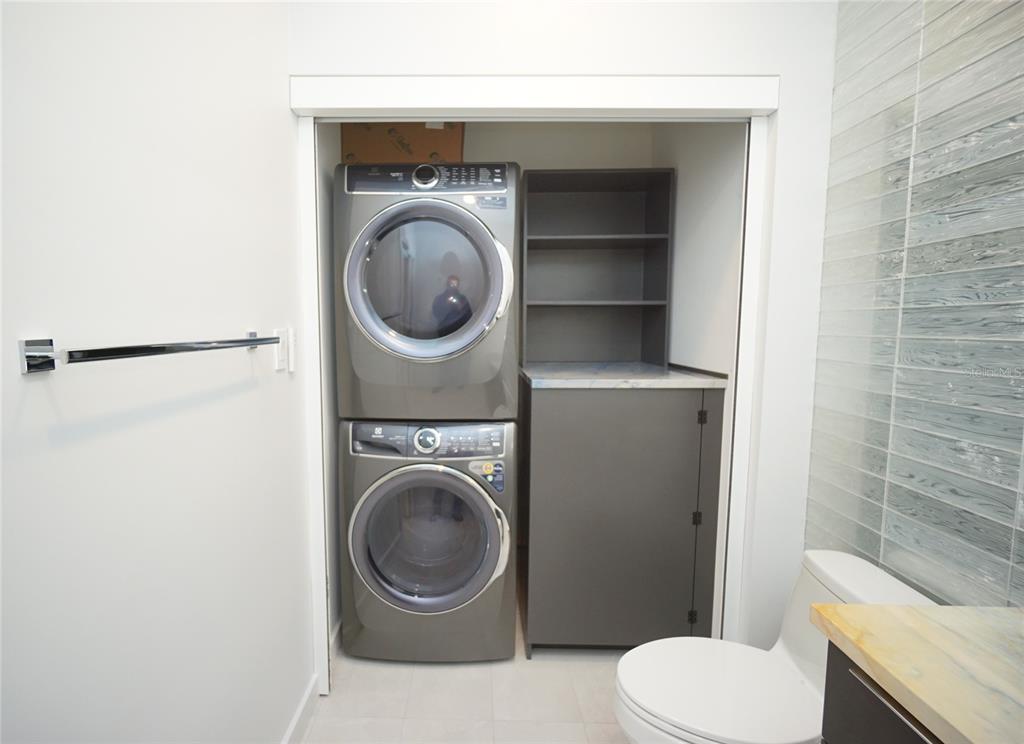 5000 Culbreath Key Way, Unit 9326 Tampa, FL 33611 - Photo 20 of 35 a utility room with dryer and washer