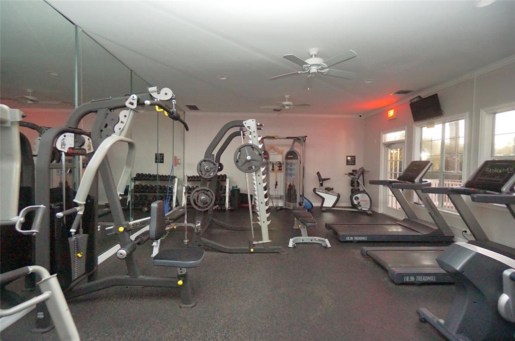 5000 Culbreath Key Way, Unit 9326 Tampa, FL 33611 - Photo 27 of 35 a view of a room with gym equipment