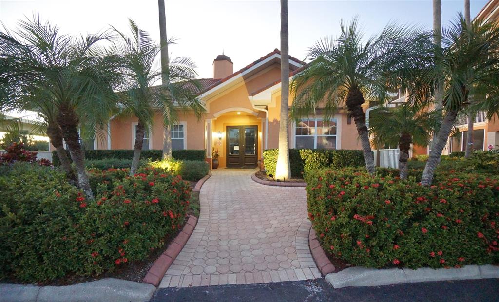 5000 Culbreath Key Way, Unit 9326 Tampa, FL 33611 - Photo 30 of 35 a front view of a house with a garden