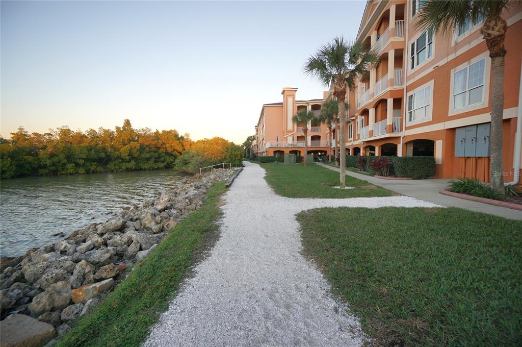 5000 Culbreath Key Way, Unit 9326 Tampa, FL 33611 - Photo 6 of 35 a view of a street with a building in the background