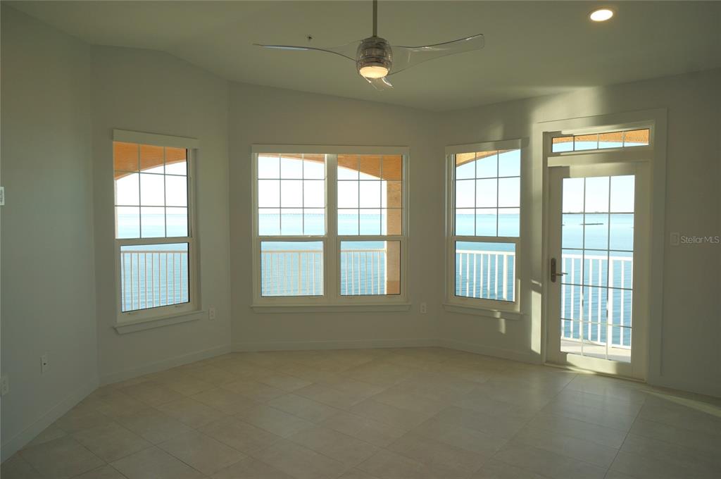 5000 Culbreath Key Way, Unit 9326 Tampa, FL 33611 - Photo 8 of 35 an empty room with a empty space and windows