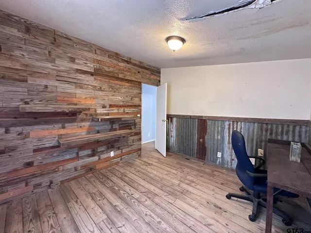 a view of a chairs and table in a room