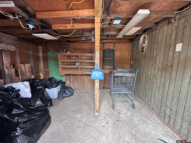 a view of a chairs and table in the patio