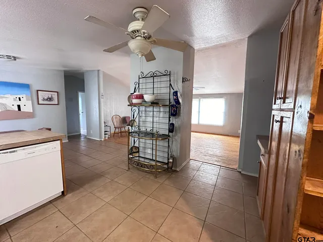 a view of a storage & utility room with a window