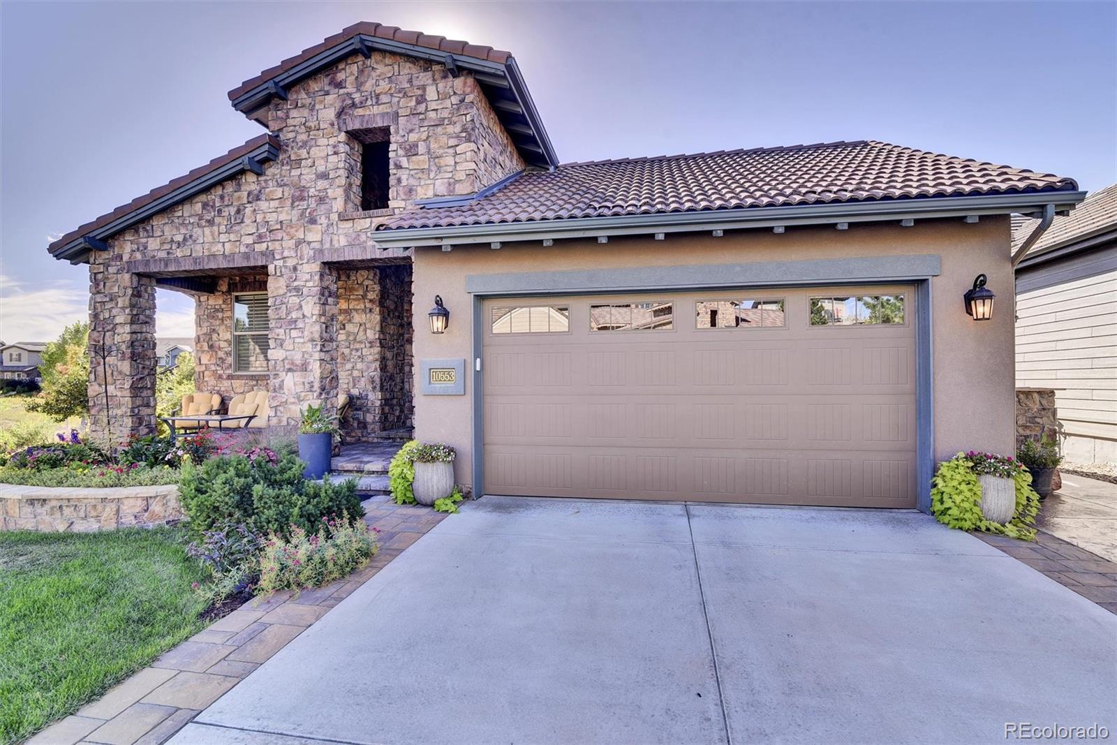 a front view of a house with a garage