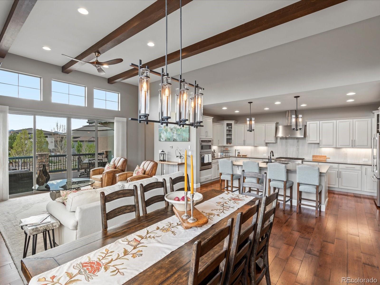 10553 Fairhurst Way Highlands Ranch, CO 80126 - Photo 14 of 35 a living room with lots of furniture and a large window