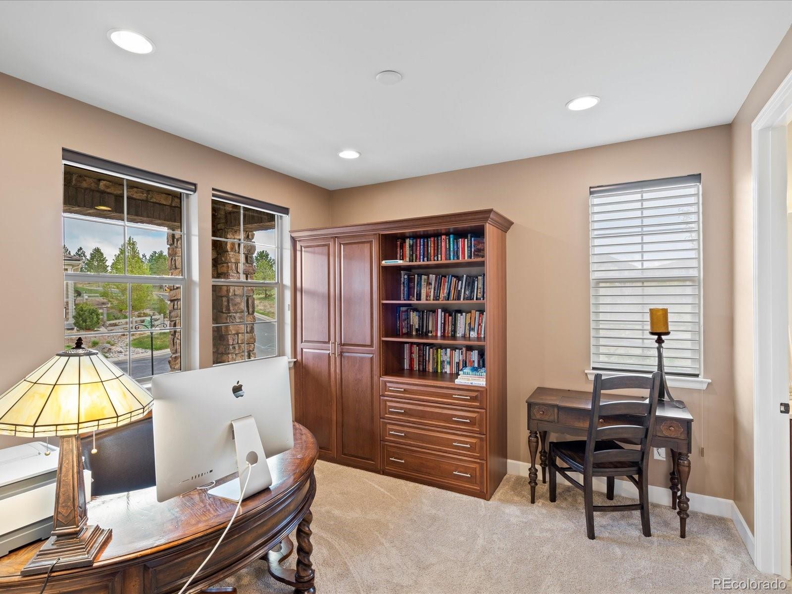 10553 Fairhurst Way Highlands Ranch, CO 80126 - Photo 10 of 35 a living room with furniture and a window