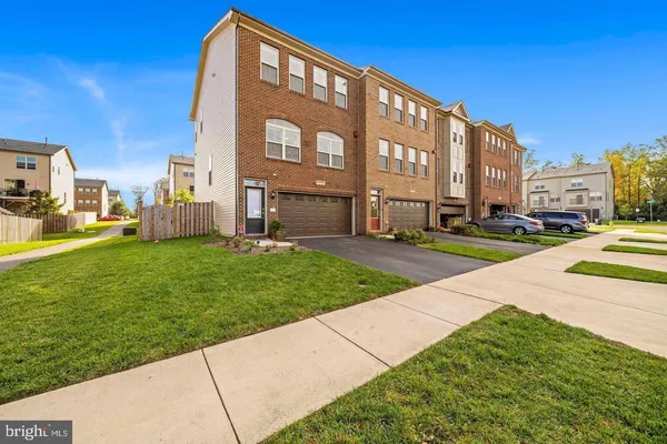 a view of a building with a yard