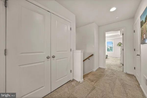 a view of a hallway with an empty space