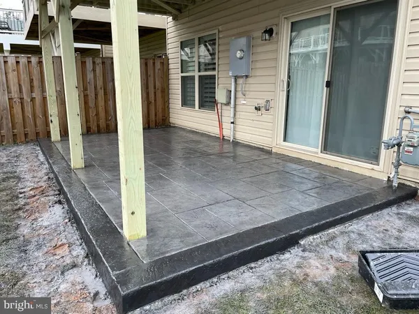 a view of a back yard of the house