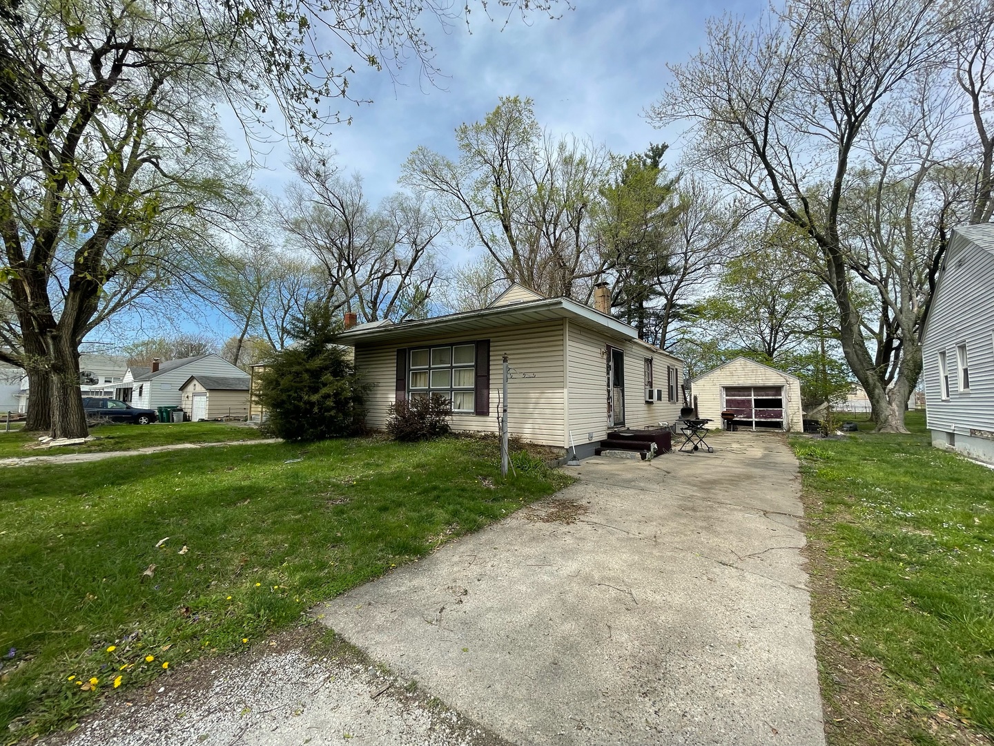 1536 East Division Street Decatur, IL 62526 - Photo 2 of 13 a front view of a house with a yard and trees
