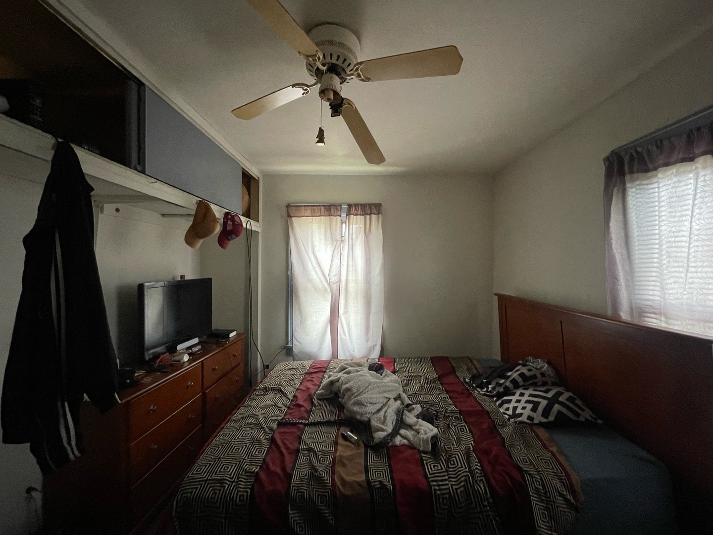 1536 East Division Street Decatur, IL 62526 - Photo 7 of 13 a bedroom with bed and flat screen tv