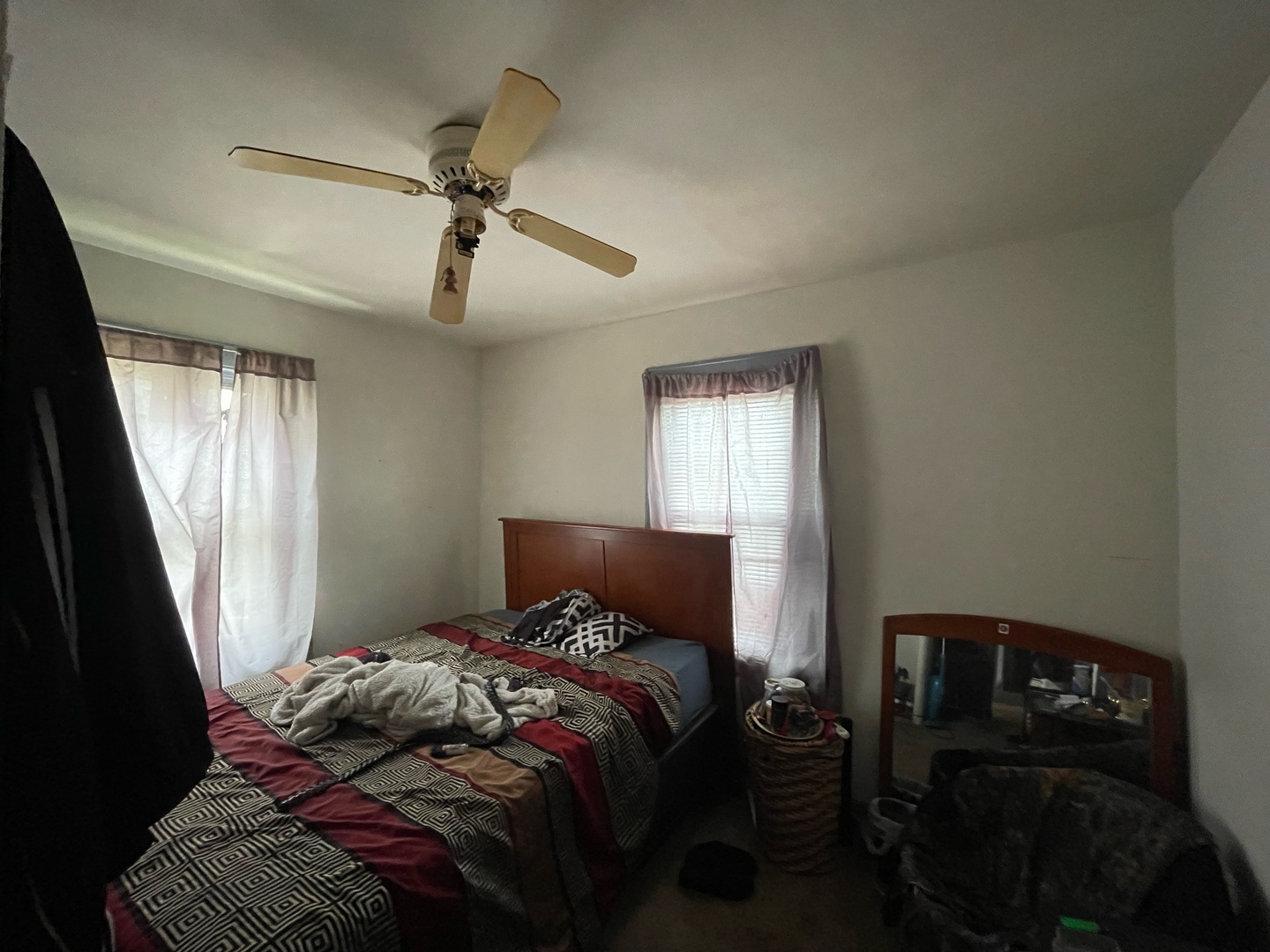 1536 East Division Street Decatur, IL 62526 - Photo 8 of 13 a bedroom with a bed and a window