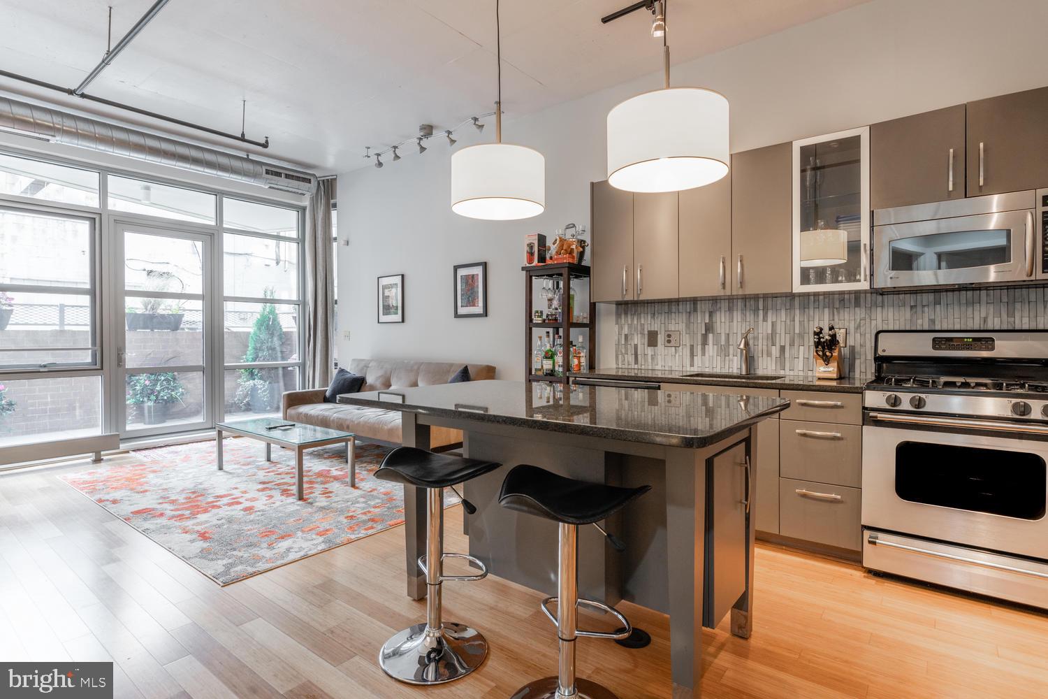 1444 Church Street Northwest, Unit 101 Washington, DC 20005 - Photo 3 of 24 Open Kitchen/Dining/Living Area