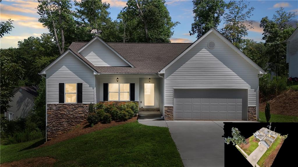 a front view of a house with a yard