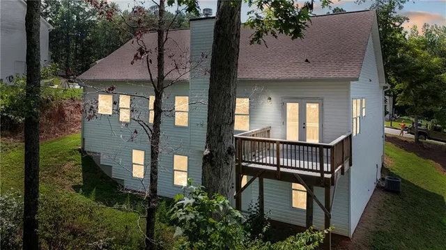 an aerial view of a house having patio