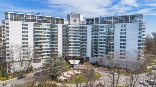a view of a balcony with a lounge chair