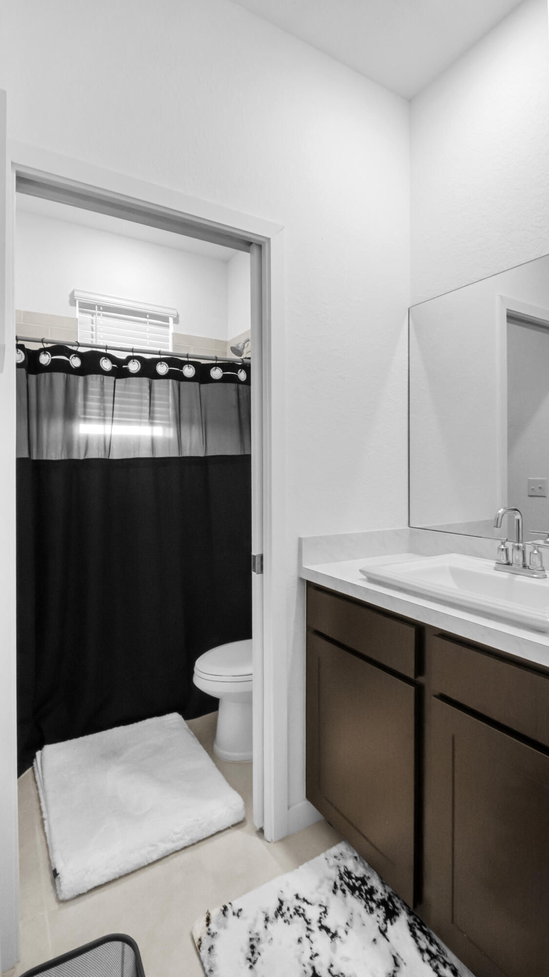 185 Bandol Street Riviera Beach, FL 33404 - Photo 16 of 28 a bathroom with a sink and a toilet