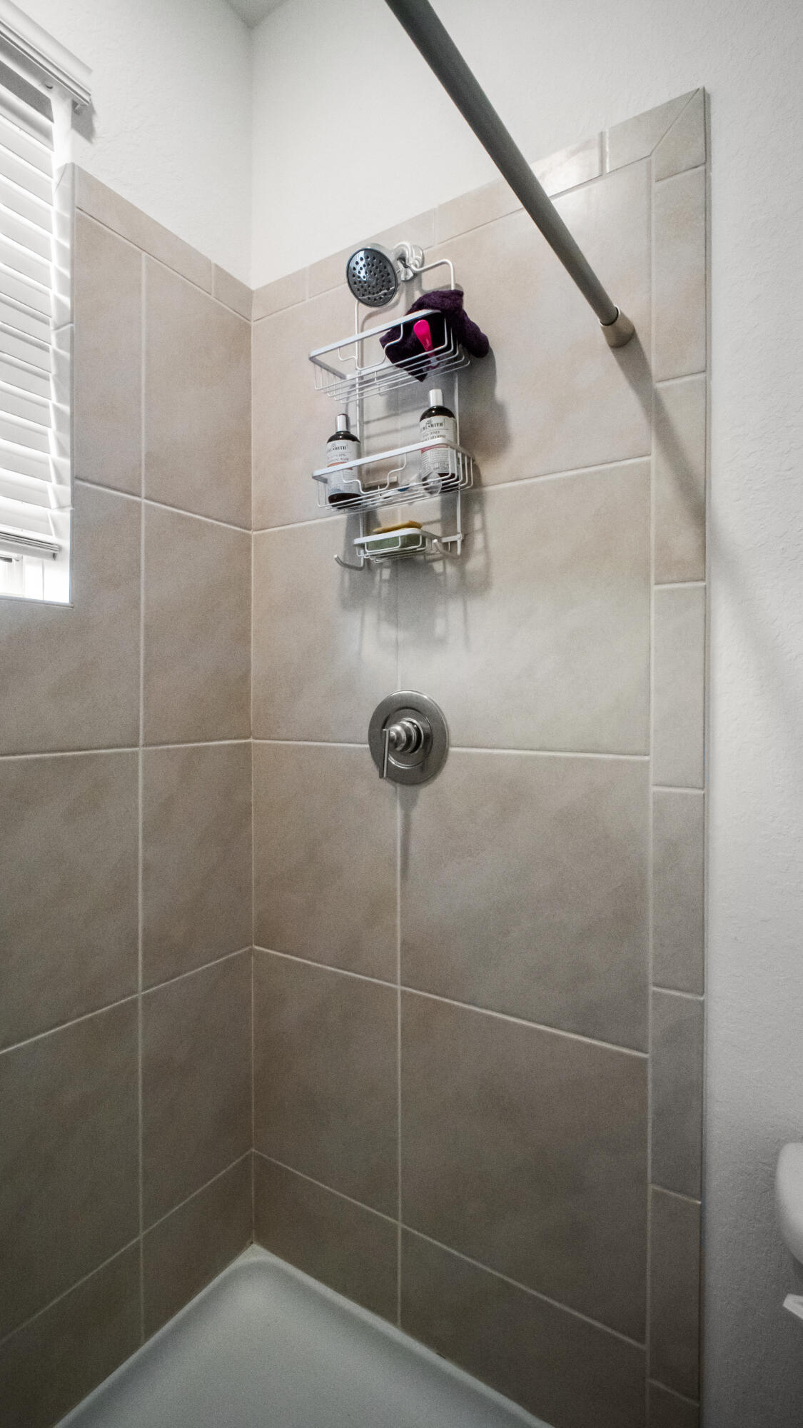 185 Bandol Street Riviera Beach, FL 33404 - Photo 18 of 28 a bathroom with a shower
