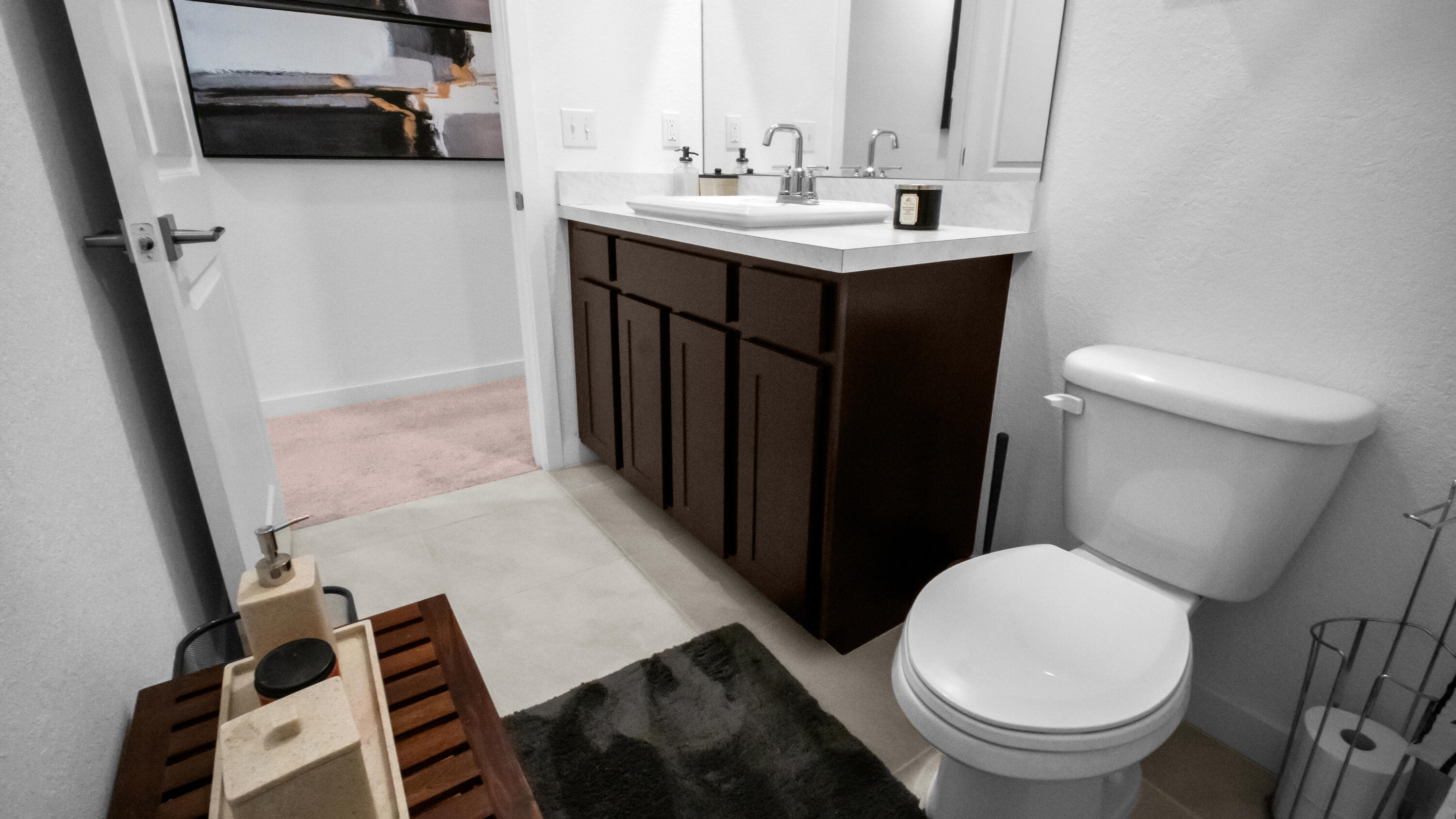 185 Bandol Street Riviera Beach, FL 33404 - Photo 22 of 28 a bathroom with a sink toilet and shower