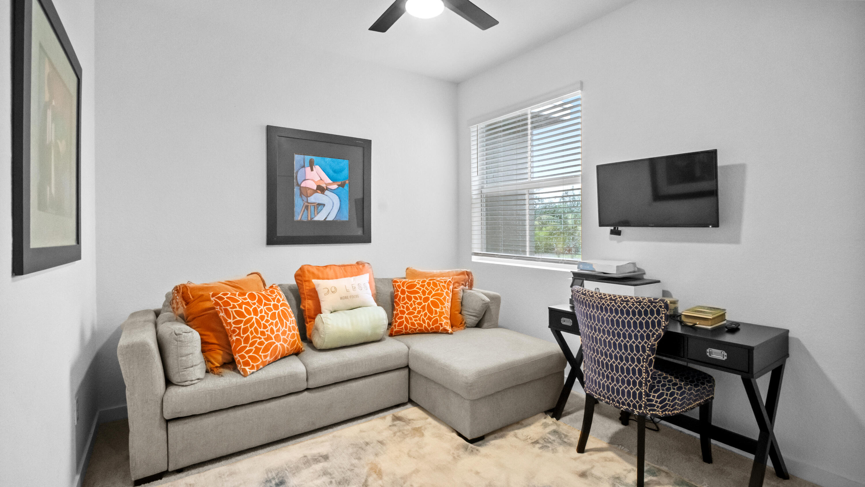 185 Bandol Street Riviera Beach, FL 33404 - Photo 23 of 28 a living room with furniture and a flat screen tv