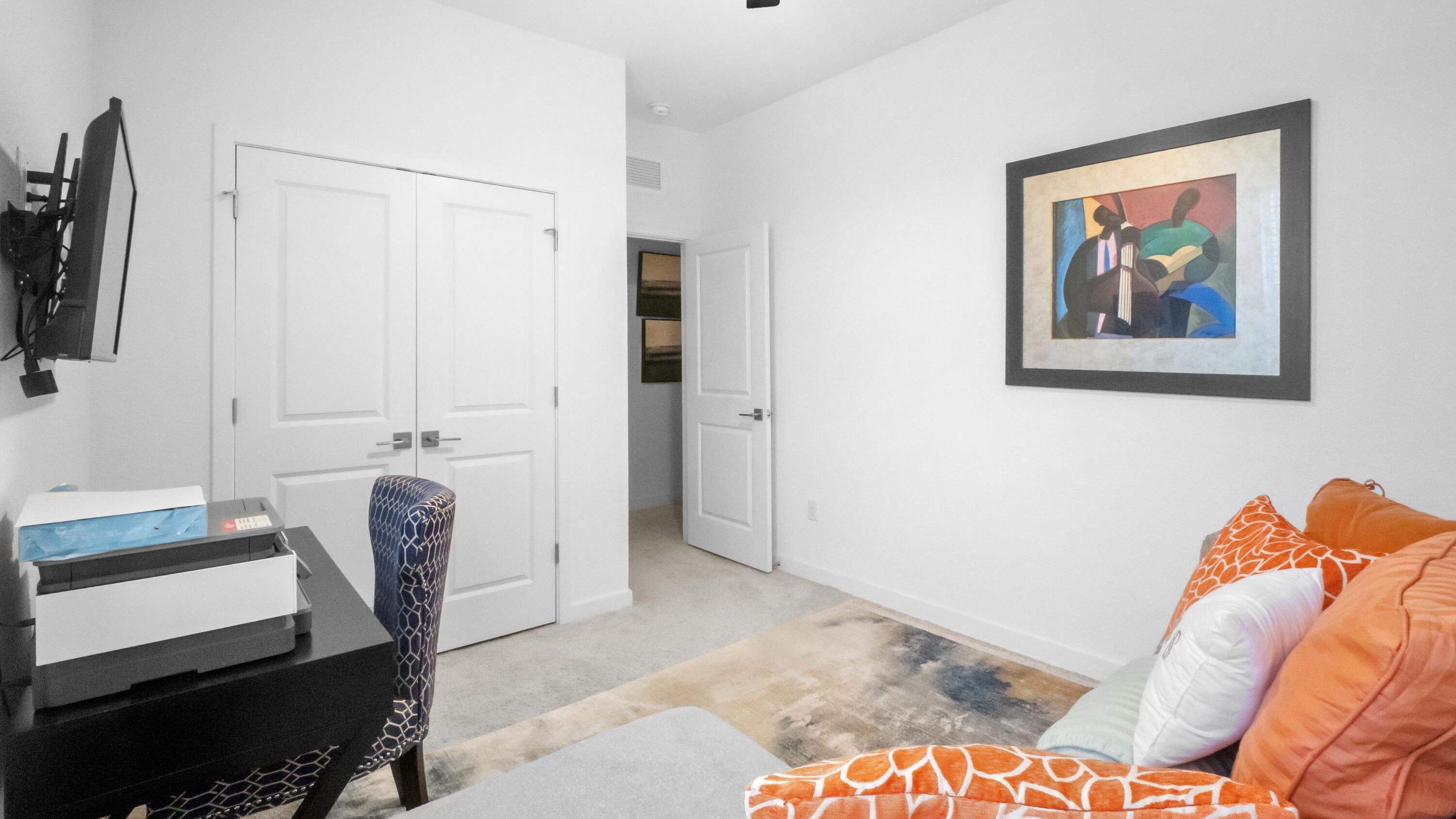 185 Bandol Street Riviera Beach, FL 33404 - Photo 24 of 28 a bedroom with a bed and a chair