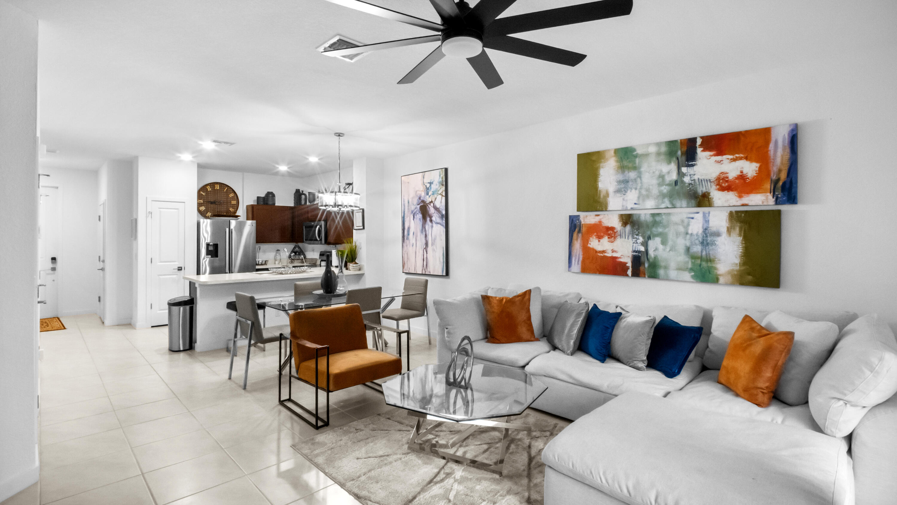 185 Bandol Street Riviera Beach, FL 33404 - Photo 6 of 28 a living room with furniture and kitchen view